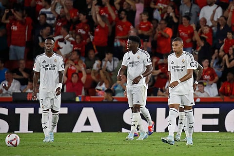 La Liga, Real Madrid vs Mallorca: Vinicius Junior, left, Aurelien Tchouameni, centre and Kylian Mbappe prepare to kick off after Mallorca's Vedat Muriqi scored a goal
